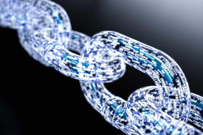 3219357-blockchain-bitcoin-657-438